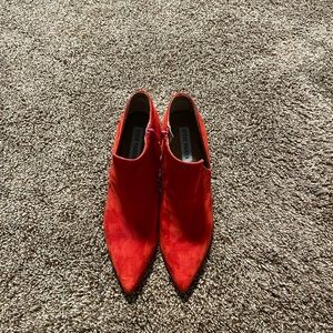 Red heeled Steve Madden Booties.
